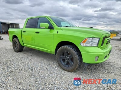 Czwarte zdjęcie samochodu z boku: 2018 RAM 1500 SLT VIN:1C6RR7LM9JS316627 - miniatura