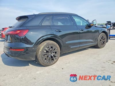 Trzecie zdjęcie samochodu z tyłu: 2024 AUDI Q8 E-TRON PRESTIGE VIN:WA16AAGE8RB052891 - miniatura