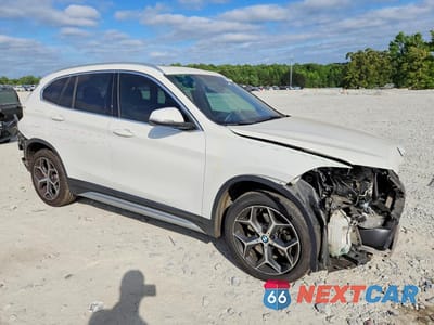 Czwarte zdjęcie samochodu z boku: 2018 BMW X1 SDRIVE28I VIN:WBXHU7C32J5L07599 - miniatura