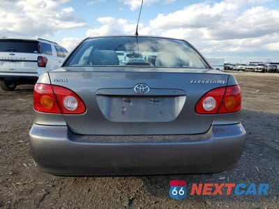 Zdjęcie 6 z 12 samochodu: 2004 TOYOTA COROLLA LE VIN:1NXBR32EX4Z308361 - miniatura