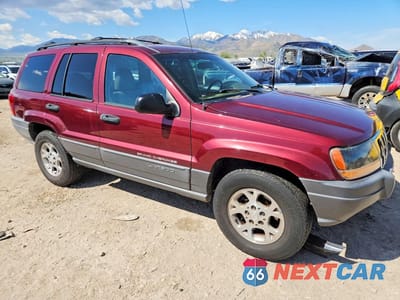Czwarte zdjęcie samochodu z boku: 2001 JEEP GRAND CHEROKEE LAREDO VIN:1J4GW48S11C621185 - miniatura