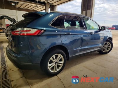 Trzecie zdjęcie samochodu z tyłu: 2019 FORD EDGE SEL VIN:2FMPK4J99KBC03382 - miniatura