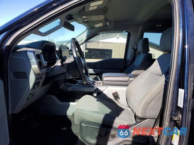 Zdjęcie 7 z 13 samochodu: 2023 FORD F150 LIGHTNING PRO VIN:1FT6W1EV9PWG42582 - miniatura