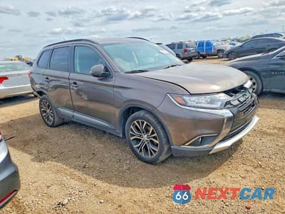 Czwarte zdjęcie samochodu z boku: 2016 MITSUBISHI OUTLANDER SE VIN:JA4AD3A31GZ015903 - miniatura