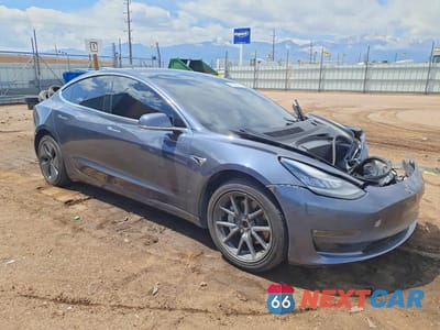 Czwarte zdjęcie samochodu z boku: 2020 TESLA MODEL 3 VIN:5YJ3E1EC3LF601738 - miniatura