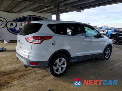 Trzecie zdjęcie samochodu z tyłu: 2014 FORD ESCAPE SE VIN:1FMCU0GX4EUD88706 - miniatura