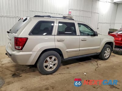 Trzecie zdjęcie samochodu z tyłu: 2010 JEEP GRAND CHEROKEE LAREDO VIN:1J4PR4GK7AC117460 - miniatura