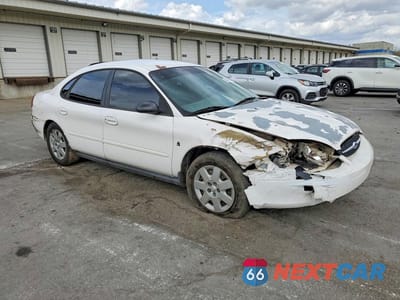 Czwarte zdjęcie samochodu z boku: 2001 FORD TAURUS LX VIN:1FAFP52201A238921 - miniatura