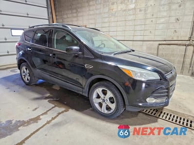 Czwarte zdjęcie samochodu z boku: 2016 FORD ESCAPE SE VIN:1FMCU9G95GUC47121 - miniatura