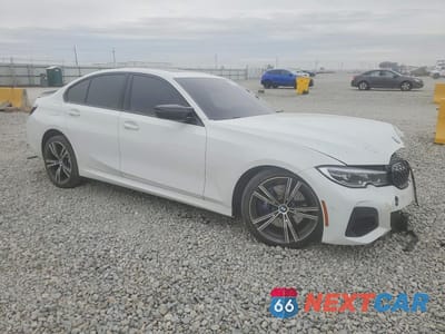 Czwarte zdjęcie samochodu z boku: 2020 BMW M340XI VIN:WBA5U9C07LA380282 - miniatura