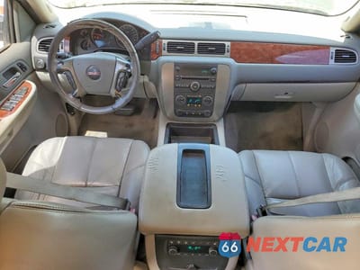 Zdjęcie 8 z 13 samochodu: 2009 GMC YUKON SLT VIN:1GKEC33329R220211 - miniatura