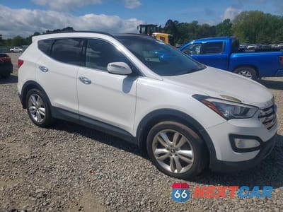 Czwarte zdjęcie samochodu z boku: 2014 HYUNDAI SANTA FE SPORT 2.0T VIN:5XYZWDLA8EG145242 - miniatura