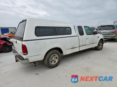 Trzecie zdjęcie samochodu z tyłu: 1999 FORD F150 VIN:1FTRX17W9XKB78409 - miniatura