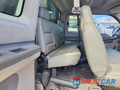 Zdjęcie 6 z 10 samochodu: 1999 FORD F350 SUPER DUTY DUMP TRUCK VIN:1FDWX36S1XED73380 - miniatura