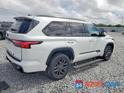 Trzecie zdjęcie samochodu z tyłu: 2023 TOYOTA SEQUOIA PLATINUM VIN:7SVAAABA1PX012579 - miniatura