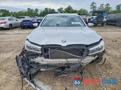 Piąte zdjęcie samochodu w środku: 2017 BMW 750 XI VIN:WBA7F2C57HG421875 - miniatura
