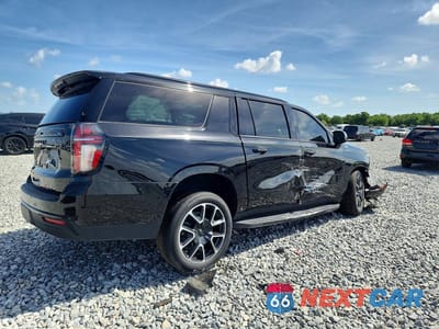 Trzecie zdjęcie samochodu z tyłu: 2023 CHEVROLET SUBURBAN C1500 RST VIN:1GNSCEKD4PR343579 - miniatura