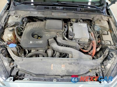 Zdjęcie 11 z 12 samochodu: 2013 FORD FUSION SE HYBRID VIN:3FA6P0LU6DR146127 - miniatura