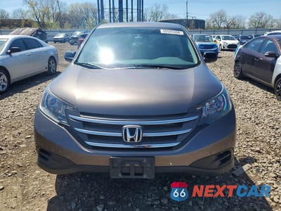Piąte zdjęcie samochodu w środku: 2014 HONDA CR-V LX VIN:2HKRM4H36EH700178 - miniatura
