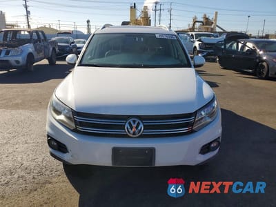 Piąte zdjęcie samochodu w środku: 2014 VOLKSWAGEN TIGUAN S VIN:WVGAV3AX4EW556248 - miniatura