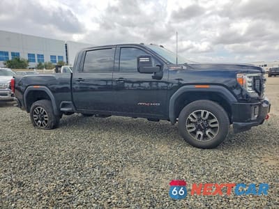 Czwarte zdjęcie samochodu z boku: 2023 GMC SIERRA K2500 AT4 VIN:1GT49PE72PF176092 - miniatura