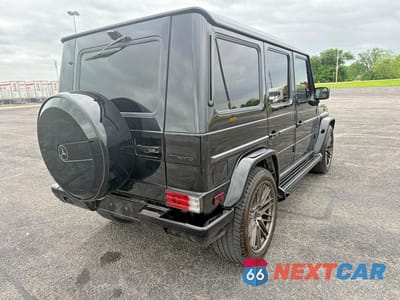 Czwarte zdjęcie samochodu z boku: 2010 MERCEDES-BENZ G 55 AMG VIN:WDCYC7BF4AX182048 - miniatura