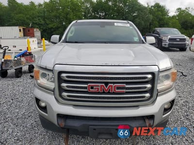 Piąte zdjęcie samochodu w środku: 2016 GMC CANYON SLE VIN:1GTH5CEA9G1347032 - miniatura