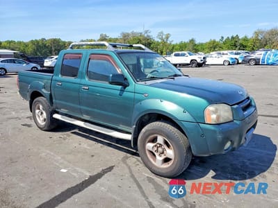 Czwarte zdjęcie samochodu z boku: 2001 NISSAN FRONTIER XE VIN:1N6ED27T31C312803 - miniatura