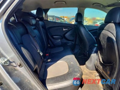 Zdjęcie 11 z 13 samochodu: 2012 HYUNDAI TUCSON GLS VIN:KM8JU3AC2CU496950 - miniatura