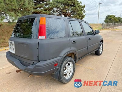 Czwarte zdjęcie samochodu z boku: 1999 HONDA CR-V EX VIN:JHLRD186XXC083443 - miniatura