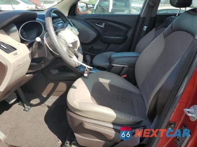 Zdjęcie 7 z 13 samochodu: 2012 HYUNDAI TUCSON GLS VIN:KM8JU3AC3CU355157 - miniatura