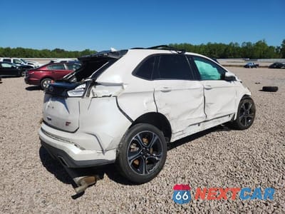 Trzecie zdjęcie samochodu z tyłu: 2019 FORD EDGE ST VIN:2FMPK4AP0KBB66673 - miniatura