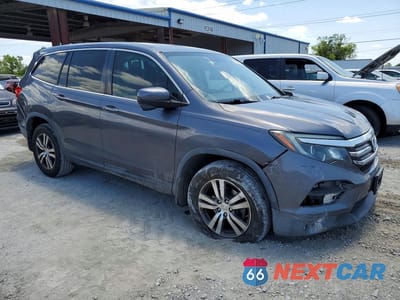 Czwarte zdjęcie samochodu z boku: 2017 HONDA PILOT EXLN VIN:5FNYF5H71HB010419 - miniatura
