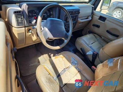 Zdjęcie 8 z 11 samochodu: 2000 JEEP WRANGLER / TJ SPORT VIN:1J4FA49SXYP751820 - miniatura