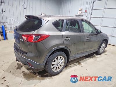 Trzecie zdjęcie samochodu z tyłu: 2016 MAZDA CX-5 TOURING VIN:JM3KE2CY7G0779194 - miniatura