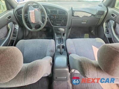 Zdjęcie 8 z 12 samochodu: 1994 TOYOTA CAMRY XLE VIN:JT2SK13EXR0228402 - miniatura