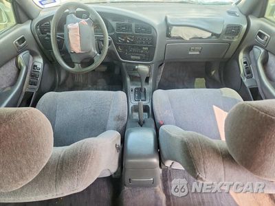 Zdjęcie 8 z 12 samochodu: 1994 TOYOTA CAMRY XLE VIN:JT2SK13EXR0228402 - miniatura