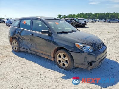 Czwarte zdjęcie samochodu z boku: 2006 TOYOTA COROLLA MATRIX XR VIN:2T1KR32E06C554050 - miniatura
