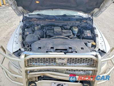 Zdjęcie 11 z 12 samochodu: 2014 RAM 2500 LONGHORN VIN:3C6UR5PL7EG299937 - miniatura