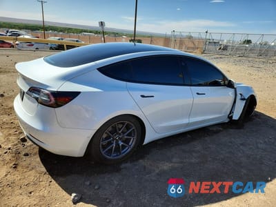 Trzecie zdjęcie samochodu z tyłu: 2021 TESLA MODEL 3 VIN:5YJ3E1EA9MF096742 - miniatura