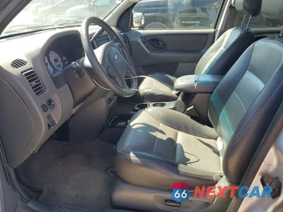 Zdjęcie 7 z 13 samochodu: 2003 FORD ESCAPE XLT VIN:1FMYU03193KA42229 - miniatura