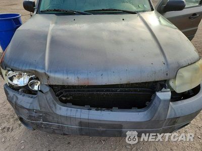 Zdjęcie 12 z 13 samochodu: 2005 FORD ESCAPE XLT VIN:1FMYU93105KA41509 - miniatura