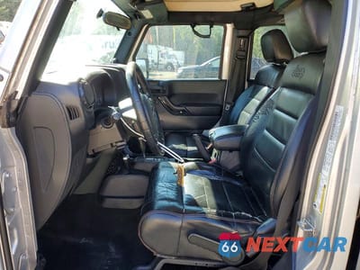 Zdjęcie 7 z 13 samochodu: 2012 JEEP WRANGLER UNLIMITED SAHARA VIN:1C4BJWEG1CL260473 - miniatura