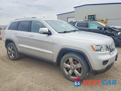 Czwarte zdjęcie samochodu z boku: 2012 JEEP GRAND CHEROKEE OVERLAND VIN:1C4RJFCT5CC171360 - miniatura