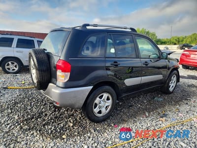 Trzecie zdjęcie samochodu z tyłu: 2003 TOYOTA RAV4 BASE VIN:JTEGH20V536011815 - miniatura