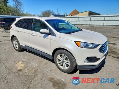 Czwarte zdjęcie samochodu z boku: 2019 FORD EDGE SEL VIN:2FMPK4J94KBC08201 - miniatura