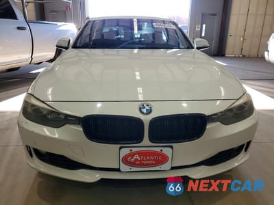 Piąte zdjęcie samochodu w środku: 2013 BMW 328 XI SULEV VIN:WBA3B5C59DF593627 - miniatura