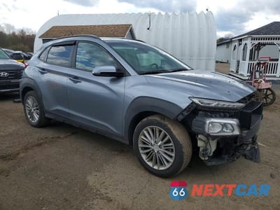 Czwarte zdjęcie samochodu z boku: 2018 HYUNDAI KONA SEL VIN:KM8K6CAA9JU149982 - miniatura
