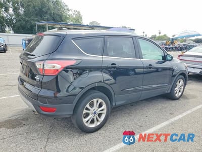 Trzecie zdjęcie samochodu z tyłu: 2017 FORD ESCAPE SE VIN:1FMCU0GD4HUA94894 - miniatura
