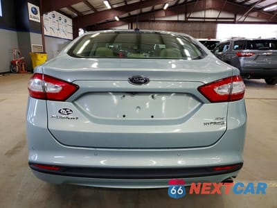 Zdjęcie 6 z 12 samochodu: 2013 FORD FUSION SE HYBRID VIN:3FA6P0LU6DR146127 - miniatura